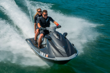 a man riding a wave on a surfboard in the water